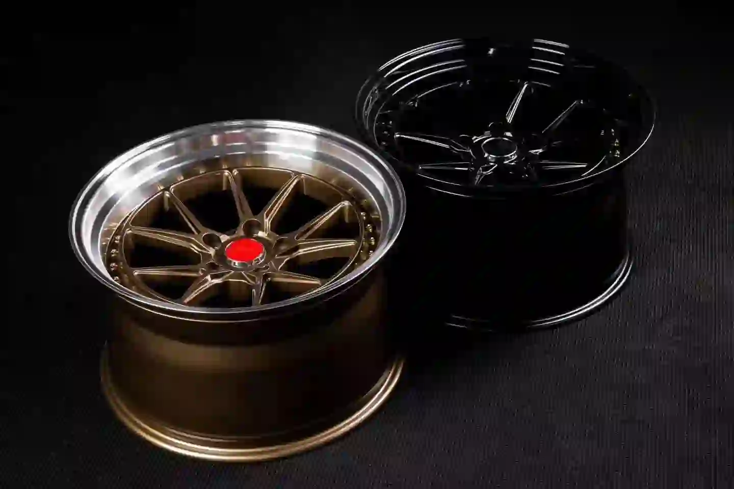Front view of 2-piece 18-inch stream forming lightweight glod black wheel for racing cars