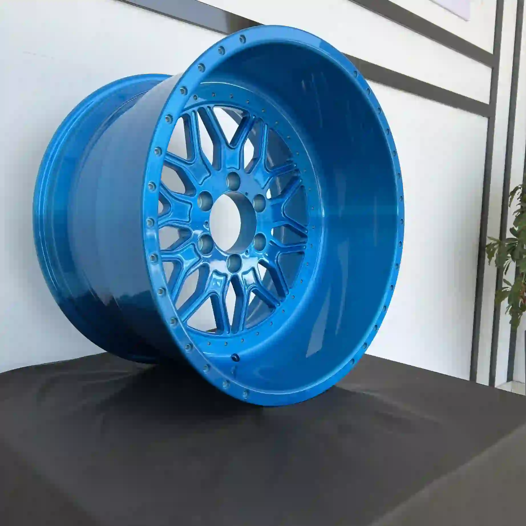 Left view of deep dish forged 20-28 inch chrome blue wheels for GMC Sierra 1500 2500 and 3500