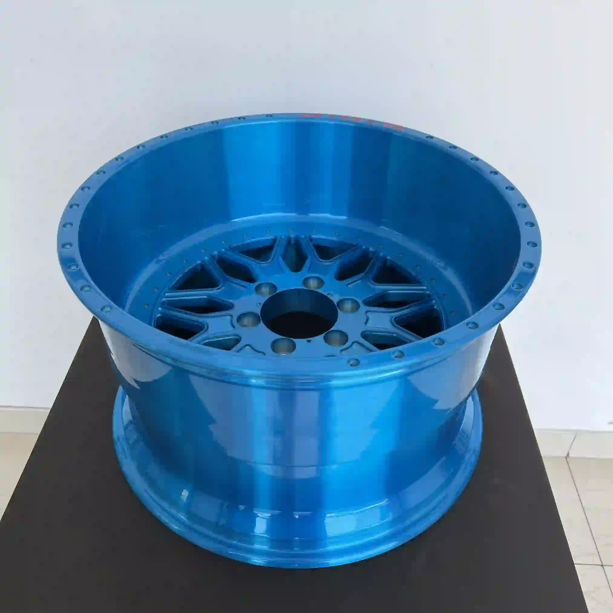 Top view of deep dish forged 20-28 inch chrome blue wheels for GMC Sierra 1500 2500 and 3500