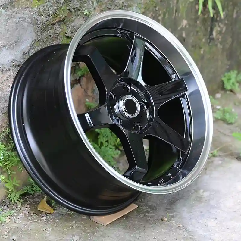 Real photo: Top view of cast black 15 16 17 18 inch wheels aluminum alloy aftermarket mag rims for passenger car