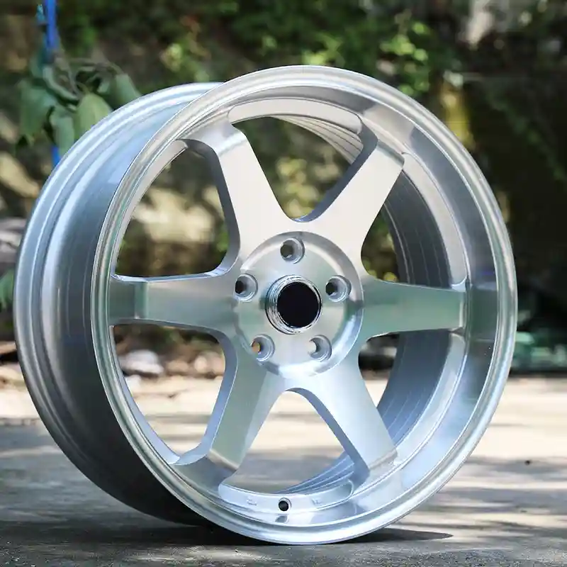 Real photo: Left view of cast silver 15 16 17 18 inch wheels aluminum alloy aftermarket mag rims for passenger car