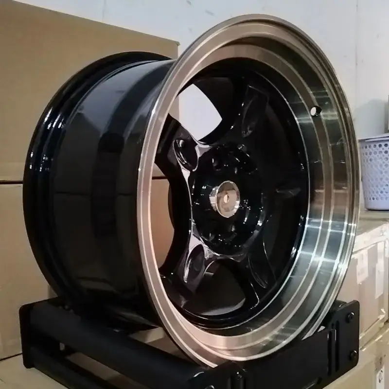 Real photo left view of hot selling cast aluminum alloy black wheels 15inch 4x100 4x114.3 PCD for Honda Fit Suzuki Swift