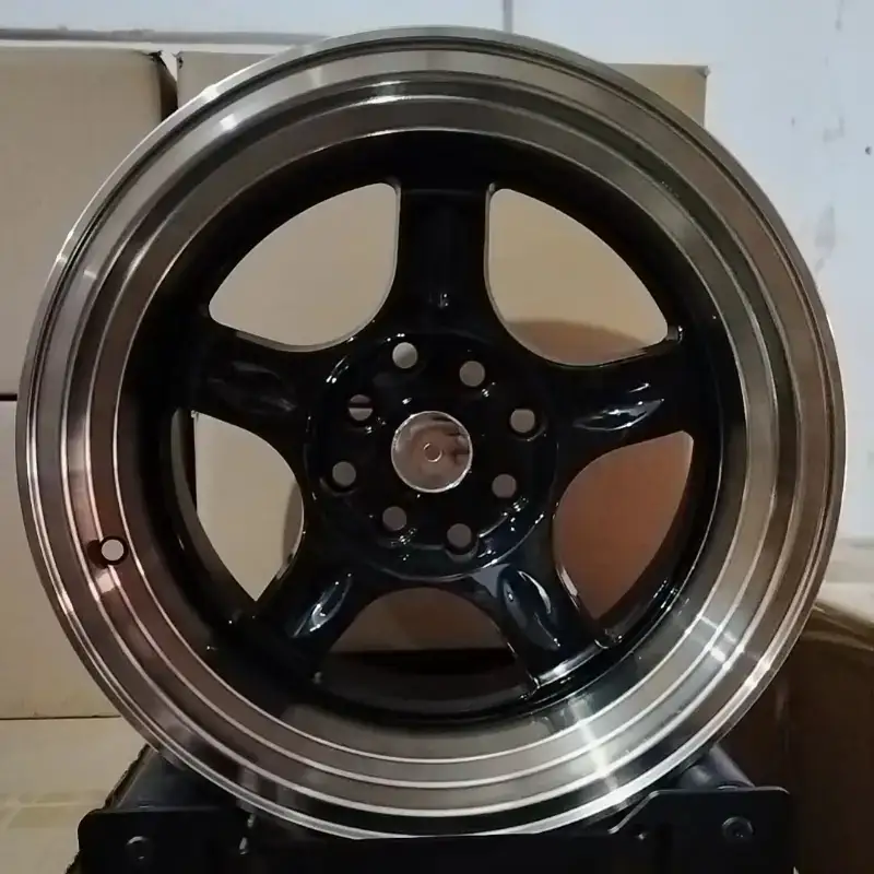 Real photo front view of hot selling cast aluminum alloy black wheels 15inch 4x100 4x114.3 PCD for Honda Fit Suzuki Swift